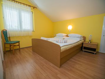 green apartment, bedroom, double bed