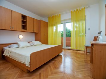 brown apartment, bedroom, double bed
