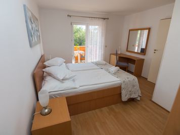 yellow apartment, bedroom, double bed