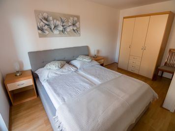 blue apartment, bedroom, double bed